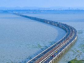 The Shijiu Lake Bridge Winds Across The Lake in Nanjing, China