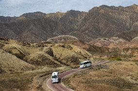 Tourists View The Danxia Landform in Zhangye, China