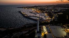 Drone View of the Lighthouse at Santa Maria di Leuca at Sunset