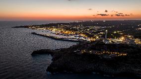 Drone View of the Lighthouse at Santa Maria di Leuca at Sunset