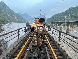 CHINA-BEIJING-HEAVY RAINFALL-STRANDED PASSENGERS-EVACUATION-COMPLETION (CN)