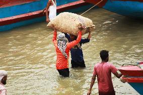 Unloading Rice - Bangladesh