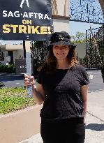 SAG-AFTRA And WGA Strike Outside Paramount Studios - LA