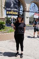 SAG-AFTRA And WGA Strike Outside Paramount Studios - LA