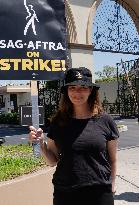 SAG-AFTRA And WGA Strike Outside Paramount Studios - LA