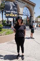 SAG-AFTRA And WGA Strike Outside Paramount Studios - LA