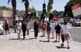 SAG-AFTRA And WGA Strike Outside Paramount Studios - LA