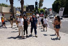 SAG-AFTRA And WGA Strike Outside Paramount Studios - LA