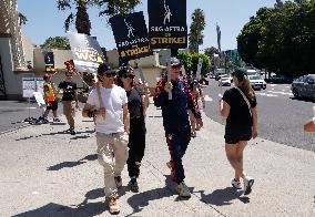 SAG-AFTRA And WGA Strike Outside Paramount Studios - LA