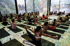 Brew Yoga At Van Gogh Alive In Bangkok.