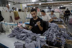 MIDEAST-GAZA CITY-FACTORY-SCHOOL UNIFORM-PRODUCTION