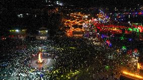 Yi Ethnic Torch Festival Marked in Qianxinan, China