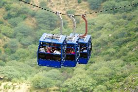 Monkeys Rest On Gondola Lift’s Pylons - Rajasthan