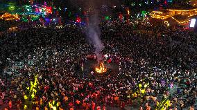 Yi Ethnic Torch Festival Marked in Qianxinan, China