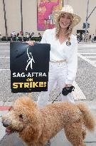 SAG AFTRA-WGA Strike outside Warner Brothers Studios - Burbank