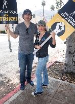 SAG AFTRA-WGA Strike outside Warner Brothers Studios - Burbank