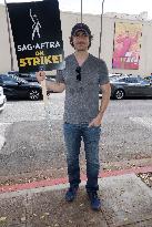 SAG AFTRA-WGA Strike outside Warner Brothers Studios - Burbank