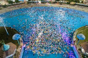 People Come To The Water Park To Cool Off in Nanjing, China