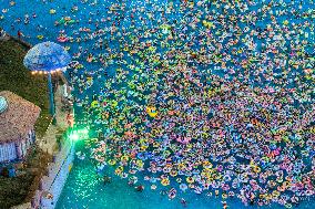 People Come To The Water Park To Cool Off in Nanjing, China