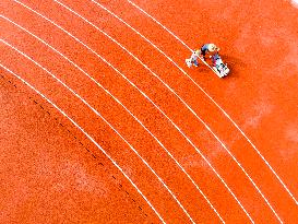 Construction Workers Carry Out Plastic Runway Marking in Lianyungang, China