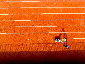 Construction Workers Carry Out Plastic Runway Marking in Lianyungang, China