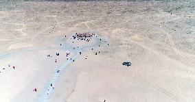 The Sculpture Son of the Earth on The Gobi Beach in Guazhou