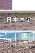 Nihon University signage and logo