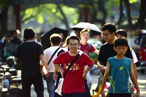 Tourists Tour The Imperial College  Street in Beijing