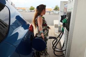 A Motorist Fills Her Car At A Petrol Station In Nevers, Center In France