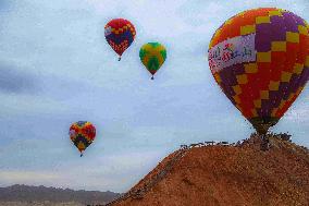 Hot Air Balloons Fly Over Colorful Danxia in Zhangye, China