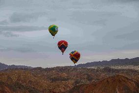 Hot Air Balloons Fly Over Colorful Danxia in Zhangye, China