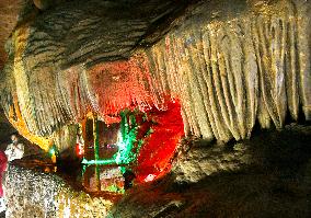 Tourists Visit The Jinshui Rock Cave in Guilin, China