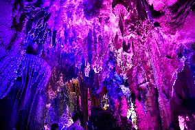 Tourists Visit The Jinshui Rock Cave in Guilin, China