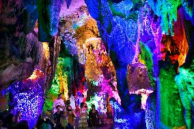 Tourists Visit The Jinshui Rock Cave in Guilin, China