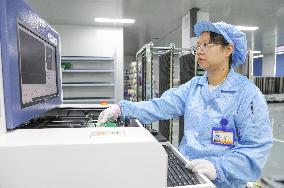 Workers Produce Integrated Circuit Chips in A Smart Workshop