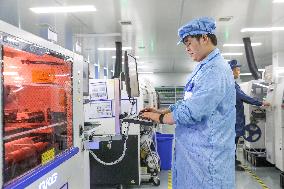 Workers Produce Integrated Circuit Chips in A Smart Workshop