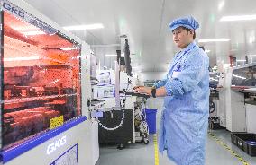 Workers Produce Integrated Circuit Chips in A Smart Workshop