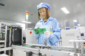 Workers Produce Integrated Circuit Chips in A Smart Workshop