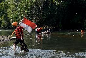 Clean Up River On The Indonesian Independence Day