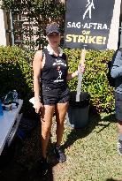 SAG-AFTRA and WGA Strike outside Warner Bros - LA