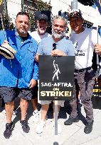 SAG-AFTRA and WGA Strike outside Warner Bros - LA