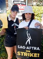 SAG-AFTRA and WGA Strike outside Warner Bros - LA