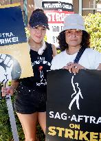 SAG-AFTRA and WGA Strike outside Warner Bros - LA