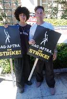 SAG-AFTRA and WGA Strike outside Warner Bros - LA