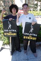 SAG-AFTRA and WGA Strike outside Warner Bros - LA