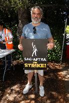 SAG-AFTRA and WGA Strike outside Warner Bros - LA