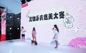 Pet Swimsuit Beauty Contest Held at The Taobao Tmall Carnival Night of the Asia Pet Fair in Shanghai, China