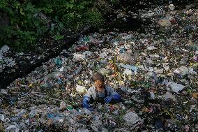 Environmental Activists Cleans Bali's Polluted River
