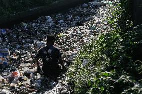 Environmental Activists Cleans Bali's Polluted River