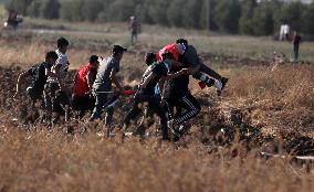 Palestinians Demonstrate Along The Israel-Gaza Border